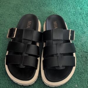 MIA Black Slide Sandals with Gold Buckle